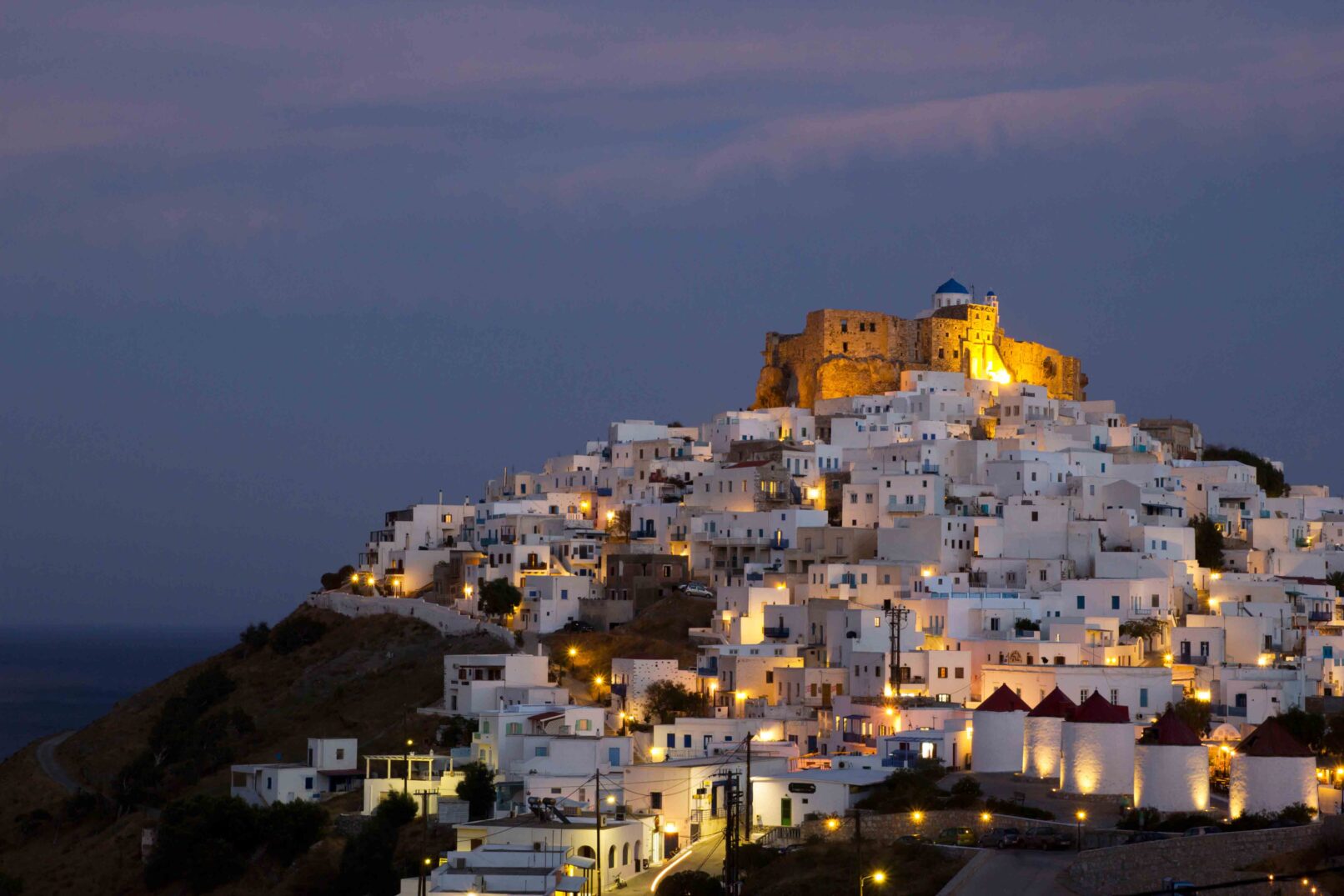 View of Chora with the historic Querini Castle at the top - Astypalea Island, Greece
